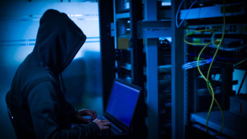 person trying to hack an information system